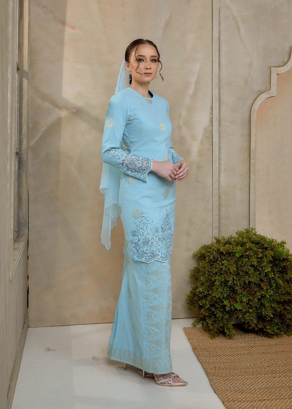 Seroja Songket Kurung in Aqua Blue